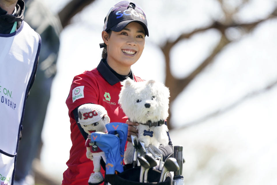 Moriya Jutanugarn waits to tee off on the first hole during the final round of the Drive On Championship golf tournament, Sunday, March 26, 2023, in Gold Canyon, Ariz. (AP Photo/Darryl Webb)