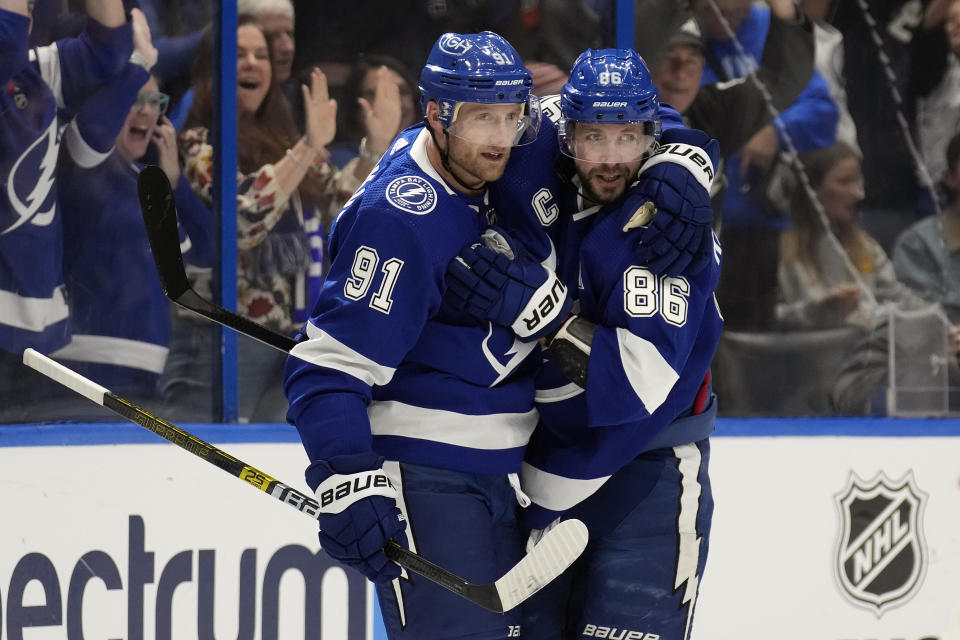 Tampa Bay Lightning center Steven Stamkos (91) celebrates his goal against the Anaheim Ducks with right wing Nikita Kucherov (86) during the second period of an NHL hockey game Saturday, Jan. 13, 2024, in Tampa, Fla. (AP Photo/Chris O'Meara)