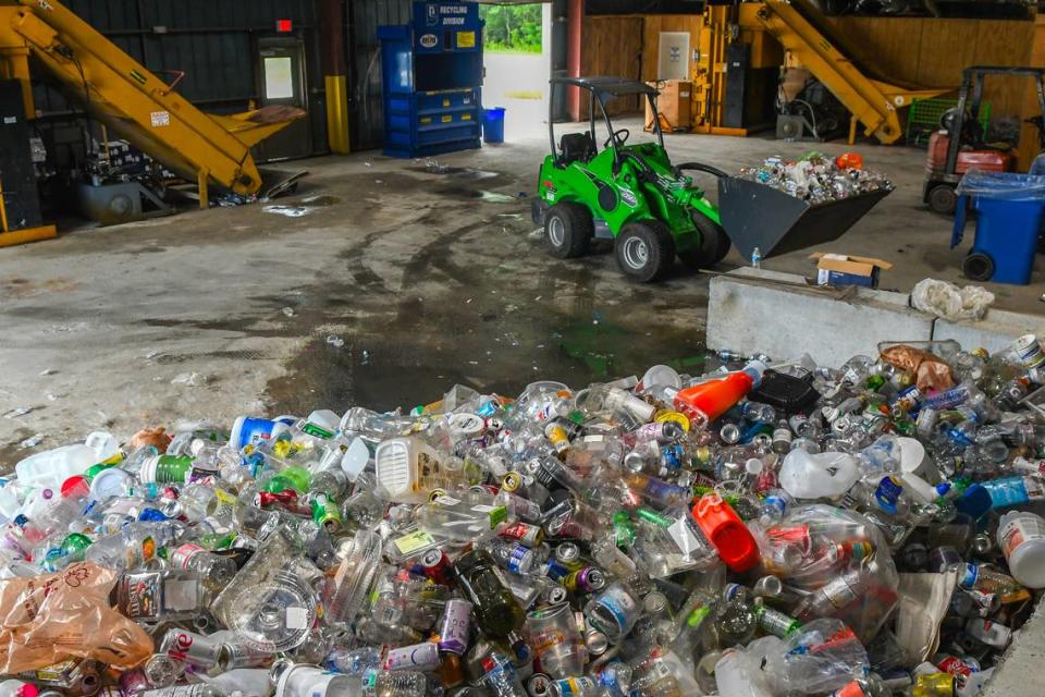 A pile of plastic, glass and aluminum waits to be sorted on July 12, 2024 at i2recycle’s facility located in the Hardeeville Industrial Park in Hardeeville, S.C.