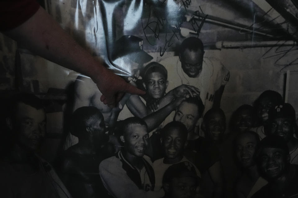 A production member shows the Associated Press an image of former baseball player Willie Mays and other former Birmingham Black Barrons players at Rickwood Field, Monday, June 10, 2024, in Birmingham, Ala. Mays played for the Birmingham Black Barons at the start of his career. Rickwood Field, known as one of the oldest professional ballpark in the United States and former home of the Birmingham Black Barons of the Negro Leagues, will be the site of a special regular season game between the St. Louis Cardinals and San Francisco Giants on June 20, 2024. (AP Photo/Brynn Anderson)