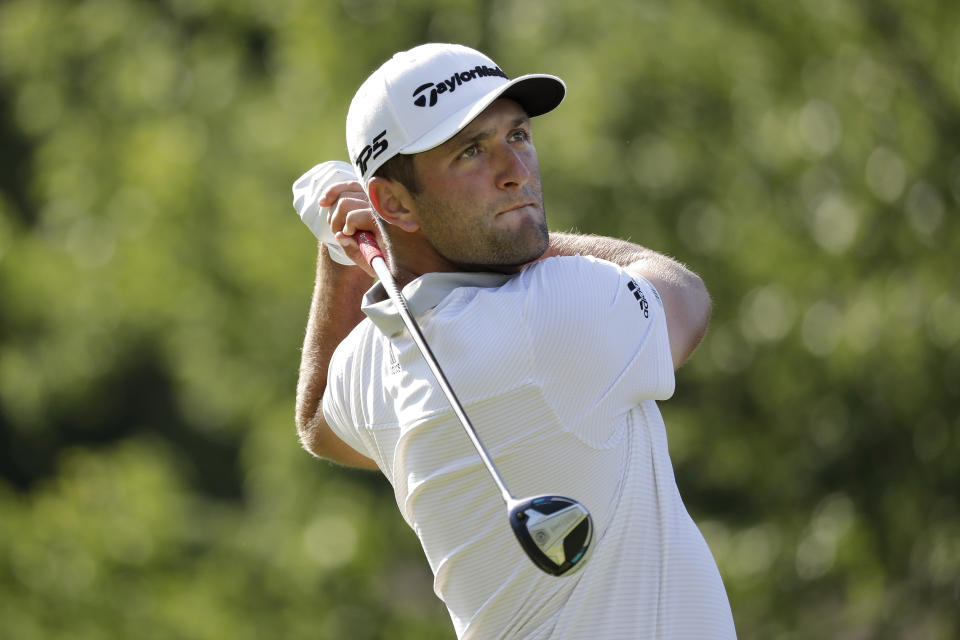 Jon Rahm, of Spain, hits from the 18th tee during the third round of the Memorial golf tournament, Saturday, July 18, 2020, in Dublin, Ohio. (AP Photo/Darron Cummings)