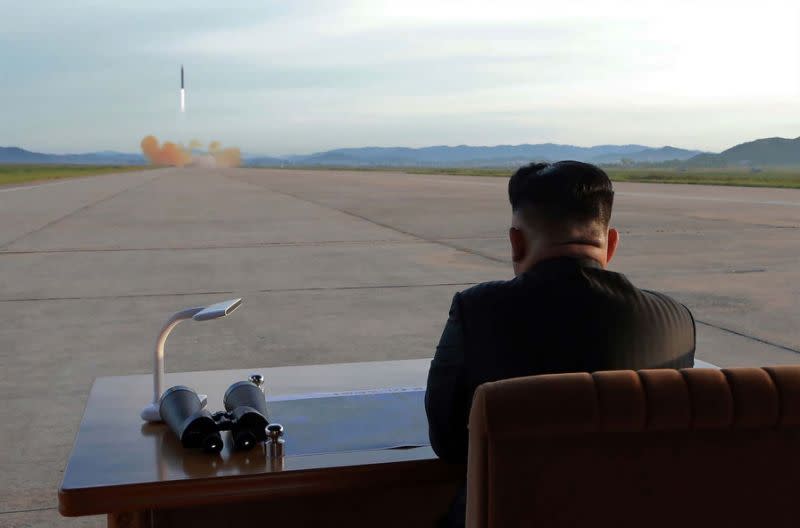 North Korean leader Kim Jong-un watches a missile test (Picture: Getty)