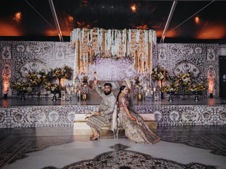 Carlita and Sanjay playing a game at their sangeet