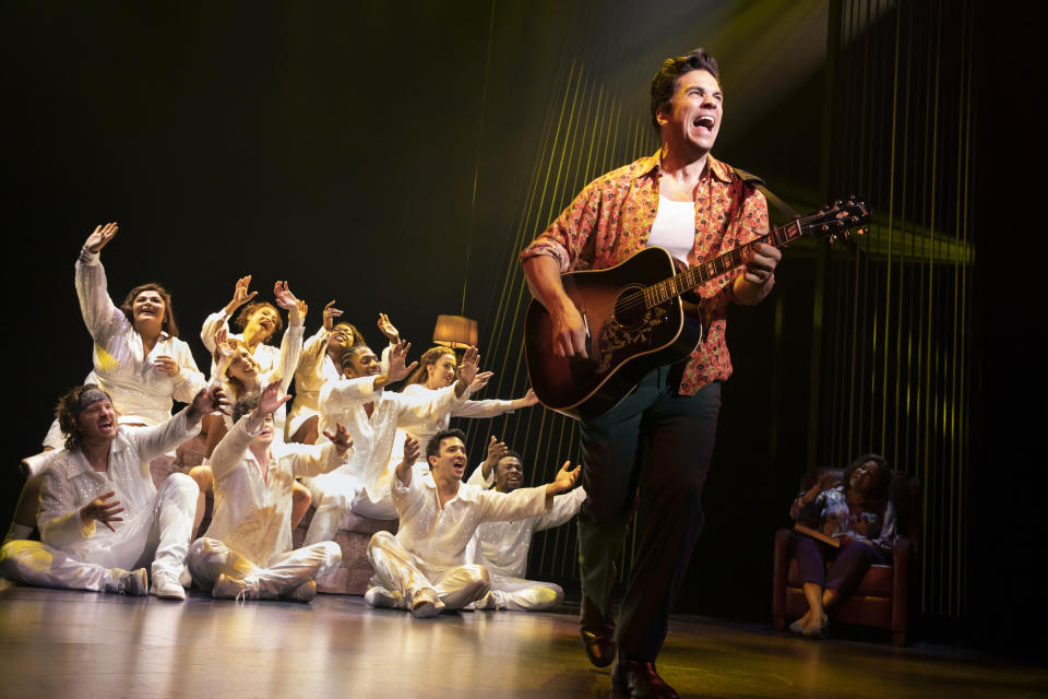 This image released by O&M/DKC shows Will Swenson as Neil Diamond during a performance of the musical “A Beautiful Noise." (Julieta Cervantes/O&M/DKC via AP)