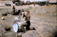 <span>The regimental mascot and a soldier being posed by a photographer (foreground), circa 1952. Photo courtesy of <a href="http://www.thememoryproject.com/stories/Korea/" rel="nofollow noopener" target="_blank" data-ylk="slk:Ron Carruth;elm:context_link;itc:0;sec:content-canvas" class="link ">Ron Carruth</a> and <a href="http://www.thememoryproject.com" rel="nofollow noopener" target="_blank" data-ylk="slk:Historica-Dominion Institute;elm:context_link;itc:0;sec:content-canvas" class="link ">Historica-Dominion Institute</a>.</span>