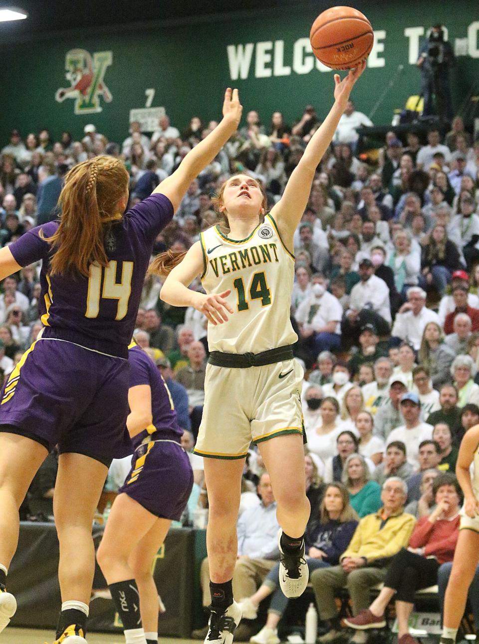 Vermont's Catherine Gilwee lays in 2 points during the Catamounts 38-36 win over Albany in the America East title game on Friday night at Patrick Gym.