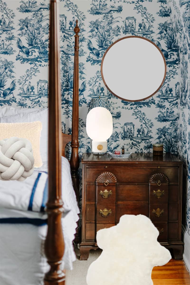 A mockup of my nightstand with Gove’s suggestions, including a circular mirror, sheepskin rug, and lamp that doesn’t fade into the background.