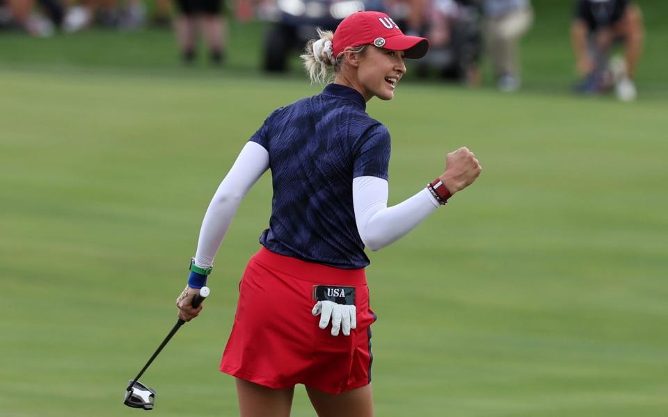 Nelly Korda of Team United States react after winning their match on the 14th hole during the Friday Fourball matches against Team Europe during the first round of the Solheim Cup 2024 at Robert Trent Jones Golf Club on September 13, 2024 in Gainesville, Virginia