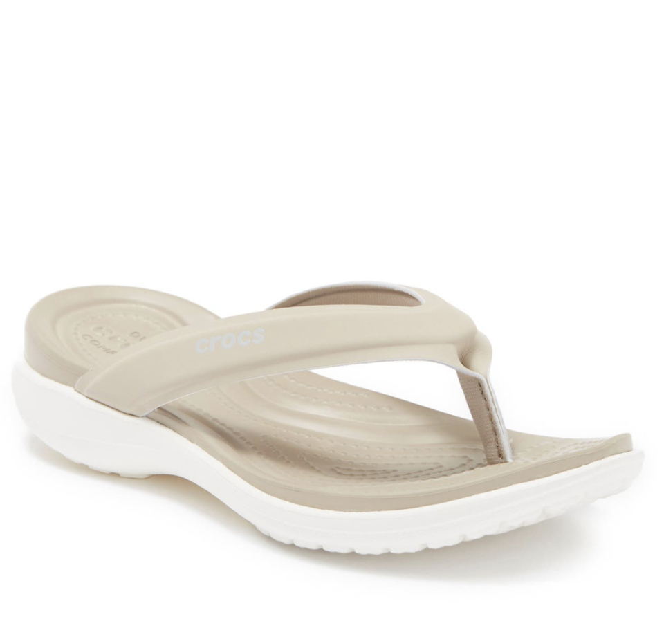 <p><a href="https://www.amazon.com/Crocs-Womens-Comfortable-Sandals-Cobblestone/dp/B0888TS52R/ref=asc_df_B0888TS52R/?tag=syn-yahoo-20&linkCode=df0&hvadid=533161041091&hvnetw=g&hvrand=15247439785912900826&hvdev=c&hvlocphy=9007331&hvtargid=pla-1186177004602&psc=1&ascsubtag=%5Bartid%7C2164.g.39316480%5Bsrc%7Cyahoo-us" rel="nofollow noopener" target="_blank" data-ylk="slk:Shop Now;elm:context_link;itc:0;sec:content-canvas" class="link ">Shop Now</a></p><p>Crocs Capri V Sporty Flip</p><p>$39.99</p><span class="copyright">Crocs</span>