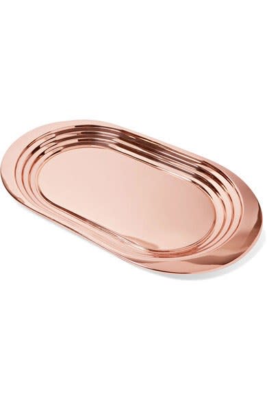 Tom Dixon Plum copper-plated tray (<a rel="nofollow noopener" href="https://www.net-a-porter.com/us/en/product/830090?resType=single&keywords=tom%20dixon%20copper%20tray&enableAjaxRequest=false" target="_blank" data-ylk="slk:net-a-porter.com;elm:context_link;itc:0;sec:content-canvas" class="link ">net-a-porter.com</a>)