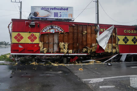 A smoke shop lays destroyed after Hurricane Irma blew though Fort Lauderdale, Florida, U.S., September 10, 2017. REUTERS/Carlo Allegri