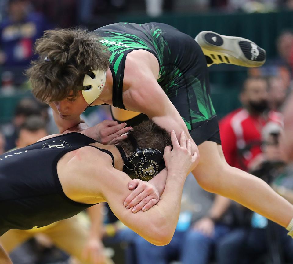 Highland's Brandon Bickerton hit the "flying squirrel" with success to score a takedown with one second left to win a Division I state title at 106 pounds.