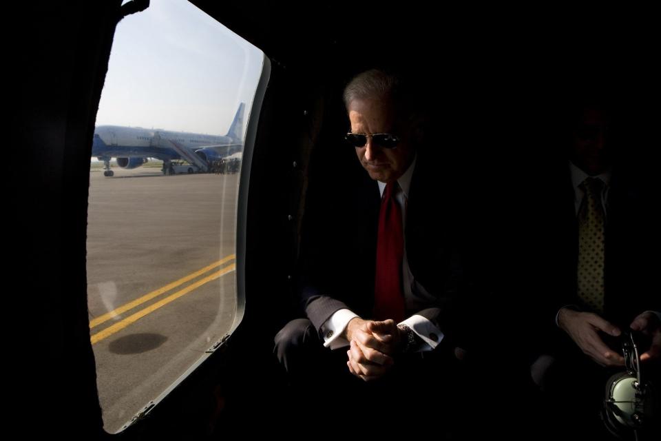 Vice President Joe Biden leans forward into the window light as he waits for the blades on the helicopter to spin down before boarding Air Force Two at Pristina Airport in Kosovo, Friday, May 22,&nbsp;2009.