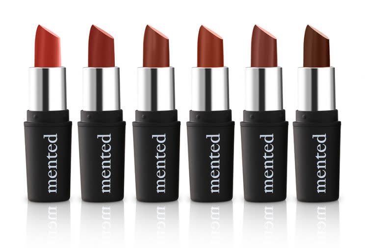 Six tubes of Mented lipstick in various shades.