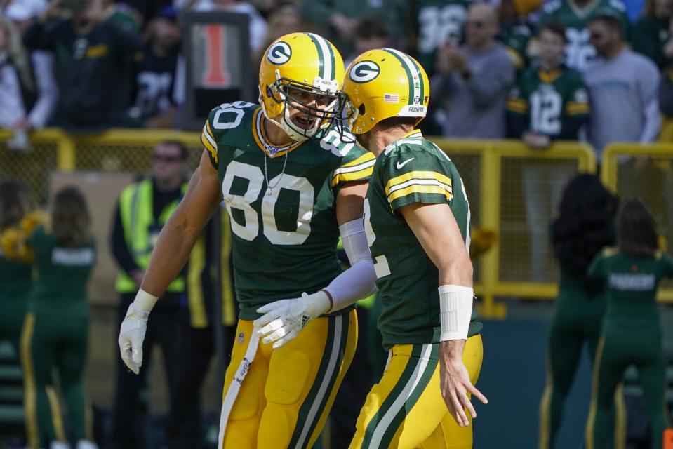 Green Bay Packers' Jimmy Graham celebrates a touchdown catch with Aaron Rodgers (12). (AP Photo/Morry Gash)