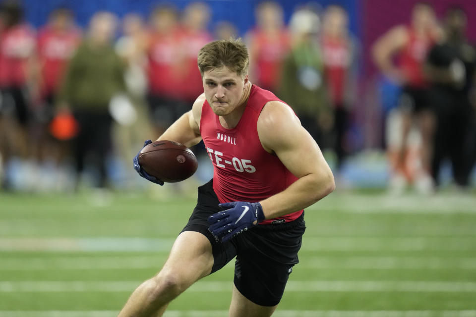 FILE - South Dakota State tight end Tucker Kraft runs a drill at the NFL football scouting combine in Indianapolis, Saturday, March 4, 2023. This year’s draft class features an abundance of tight ends, and some are even calling it better than the bumper crop of 2017. “The tight end group is the best I’ve seen in the last 10 years,” NFL Network analyst Daniel Jeremiah proclaimed. (AP Photo/Michael Conroy, File)