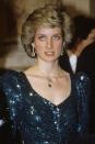 <p>Curling her hair away from her face allowed the royal to show off elaborate earrings at an Austrian gala. </p>