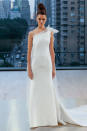 <p>One-shouldered simple white gown. (Photo: First View) </p>