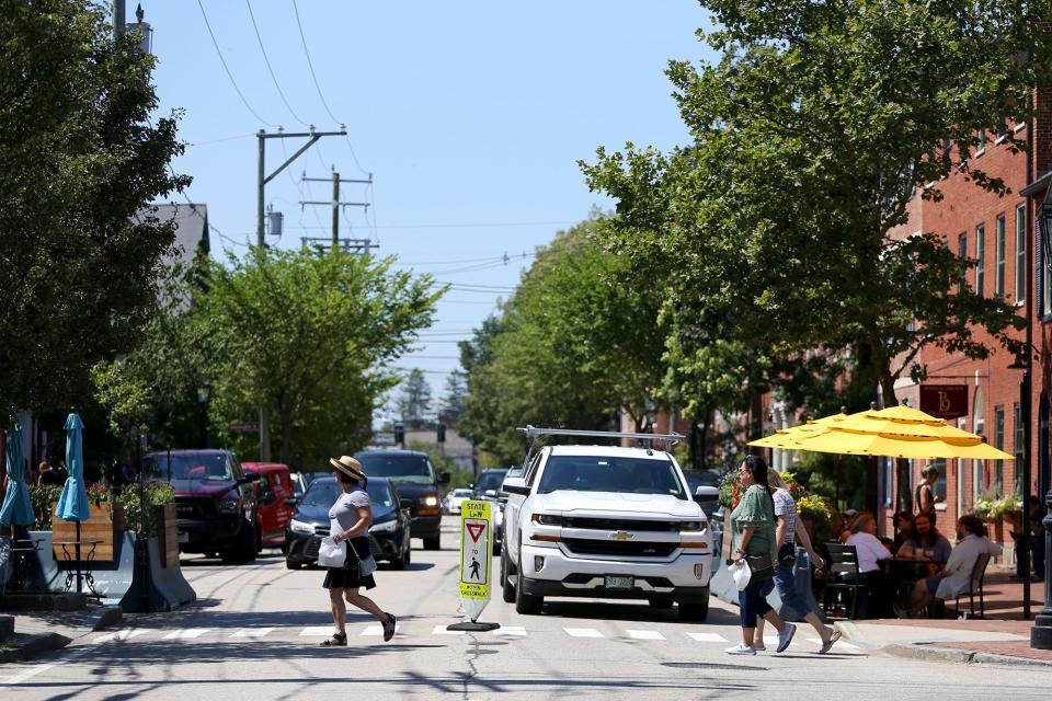 Portsmouth will study making State Street a two-way street in order to slow down drivers and make it more pedestrian friendly. People are seen here crossing the street Tuesday, Aug. 2, 2022.