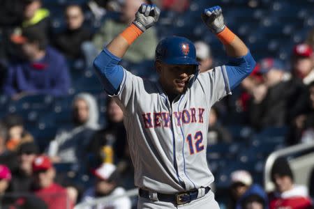 Mar 31, 2019; Washington, DC, USA; New York Mets center fielder Juan Lagares (12) celebrates after hitting a rbi single during the eighth inning against the Washington Nationals at Nationals Park. Mandatory Credit: Tommy Gilligan-USA TODAY Sports