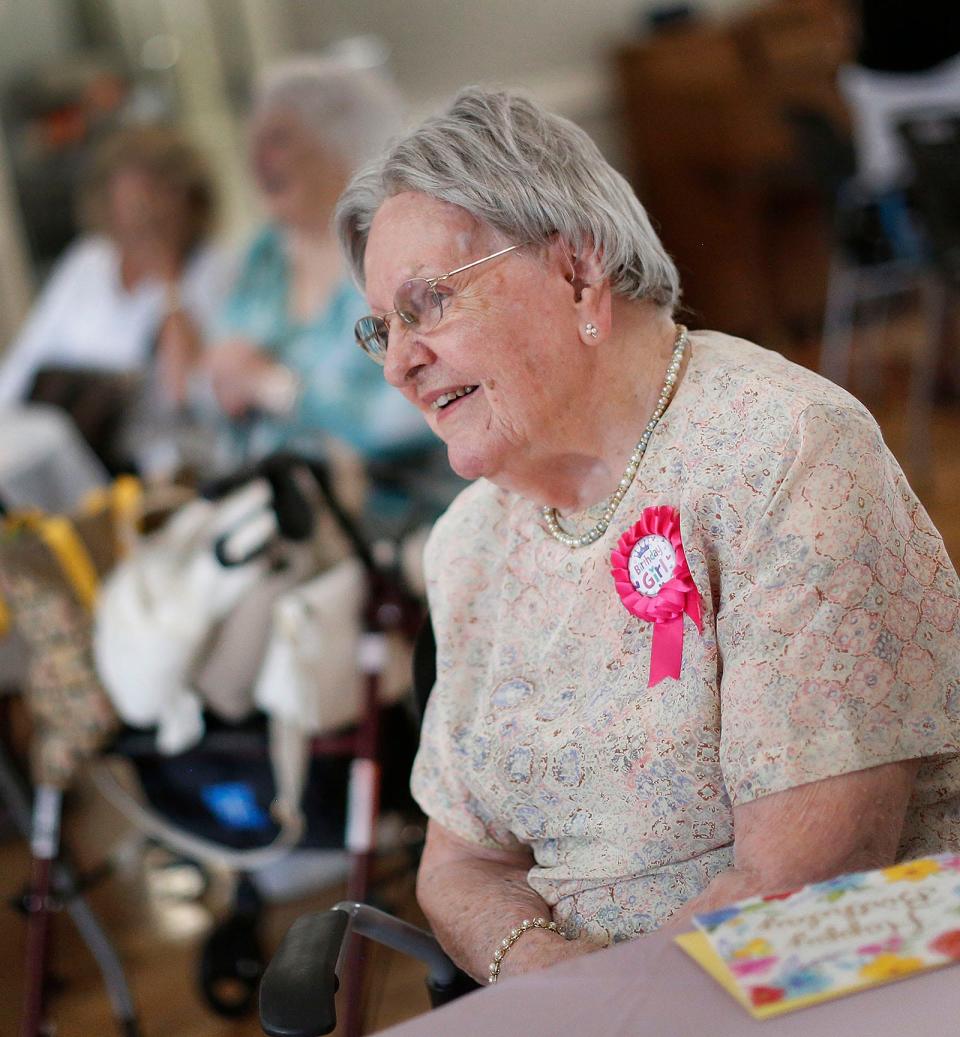 Mary "Mae" Ryan, of Milton, celebrates her 100th birthday with friends at the Milton Senior Center om Monday, July 18, 2022.