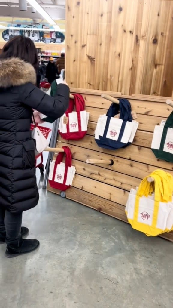 One video showed a huge group of people crowding around as employees brought the display into the store. @yjw.ai/TikTok