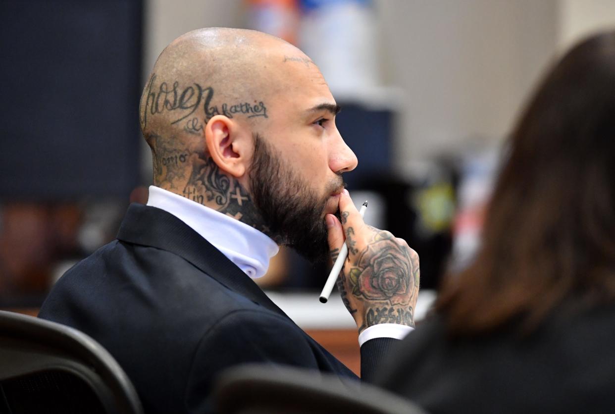 Juan Salazar-Diaz listens to testimony on the first day of his trail. Salazar-Diaz is acting as his own attorney in his trial for the September 2018 murder of Tyren Kinard in North Port.