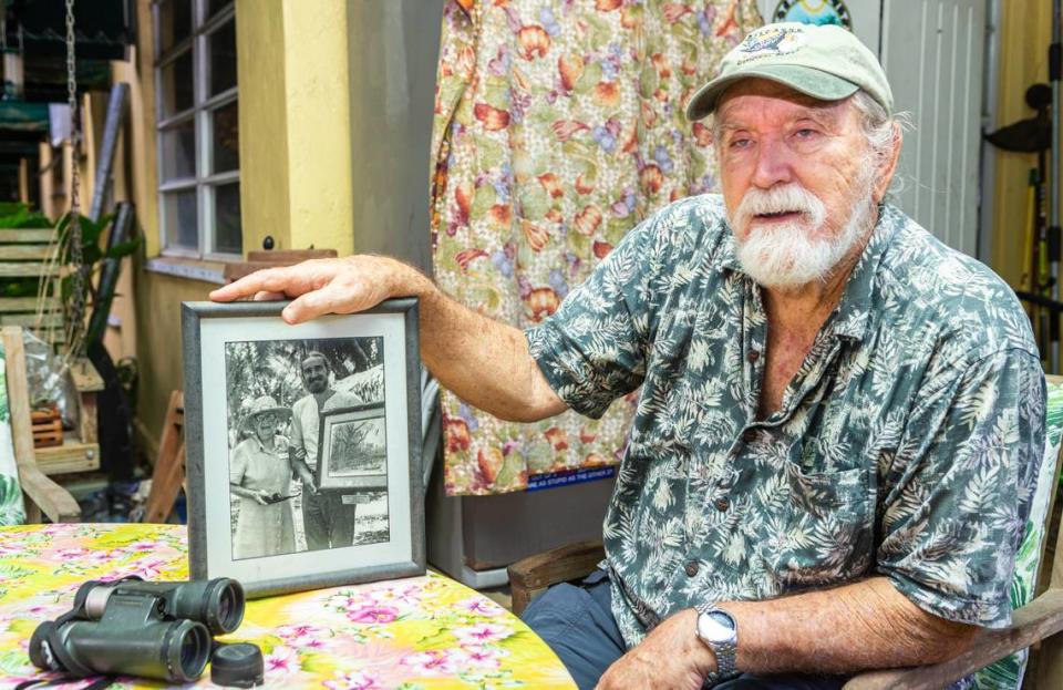 Retired Florida naturalist Roger L. Hammer, 79, displays a photograph at his home in Homestead of him and Marjory Stoneman Douglas. Hammer was awarded the Marjory Stoneman Douglas Award from the Dade Chapter of the Florida Native Plant Society in 1982. He was also awarded the Charles Brookfield Medal from the Tropical Audubon Society, the Green Palmetto Award in Education from the Florida Native Plant Society and the Lifetime Achievement Award from the Florida Native Plant Society, the Tropical Audubon Society and the Miami Blue Chapter of the North American Butterfly Association. He also holds an Honorary Doctorate of Science from Florida International University.
