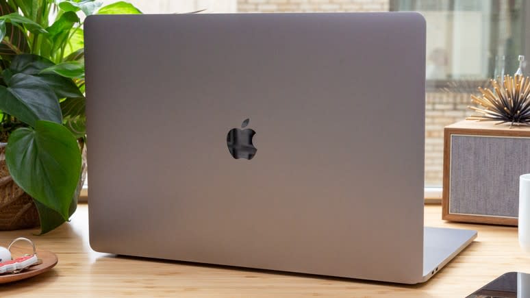  15-inch MacBook Pro 2019 with its lid open showing the Apple logo 