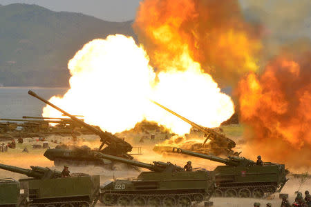 A military drill marking the 85th anniversary of the establishment of the Korean People's Army (KPA) is seen in this handout photo by North Korea's Korean Central News Agency (KCNA) made available on April 26, 2017. KCNA/Handout via REUTERS