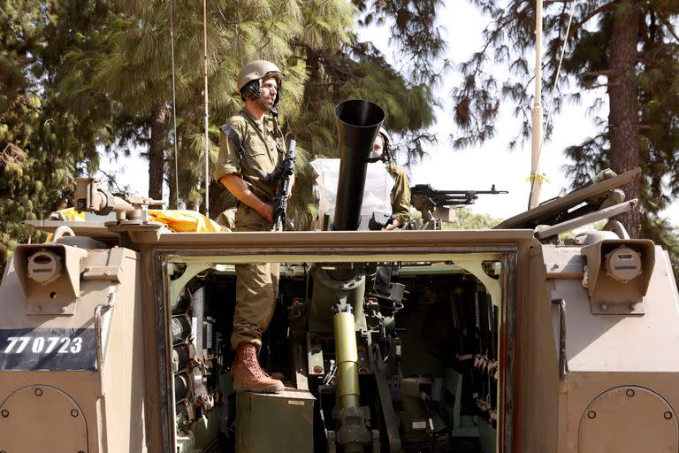 Soldados israelíes en posiciones cerca de la frontera con el Líbano.  (Jalaa MAREY / AFP)