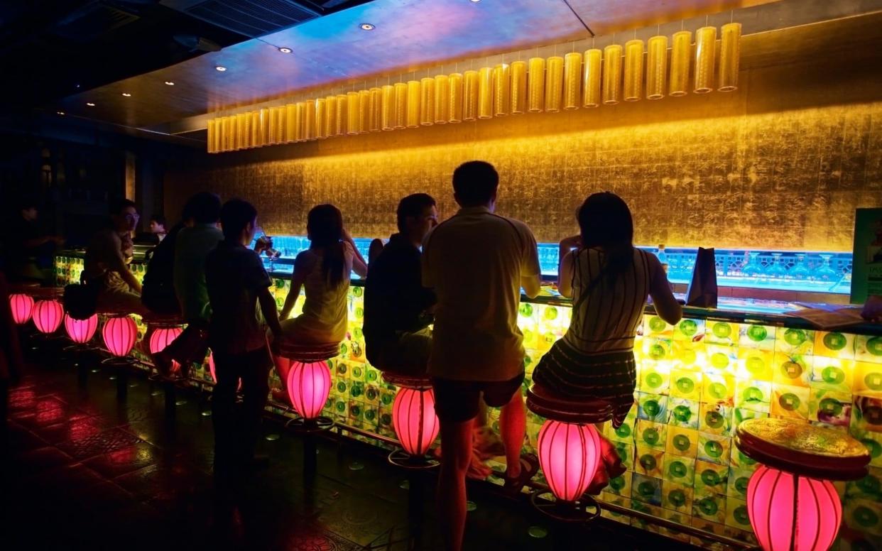 A bar in Shanghai, China - www.Alamy.com