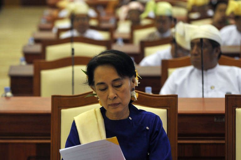 Myanmar's opposition leader Aung San Suu Kyi attends a session of the lower house of the parliament in the capital Naypyidaw, on March 6, 2013. Suu Kyi's long-silenced opposition opened its first ever party conference on Friday, as it sets its sights on the challenges of power in Myanmar after years in the political wilderness