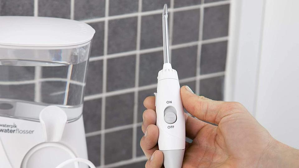 Skip the awkward strings of flossing while keeping your teeth healthy with the Waterpik Aquarius.