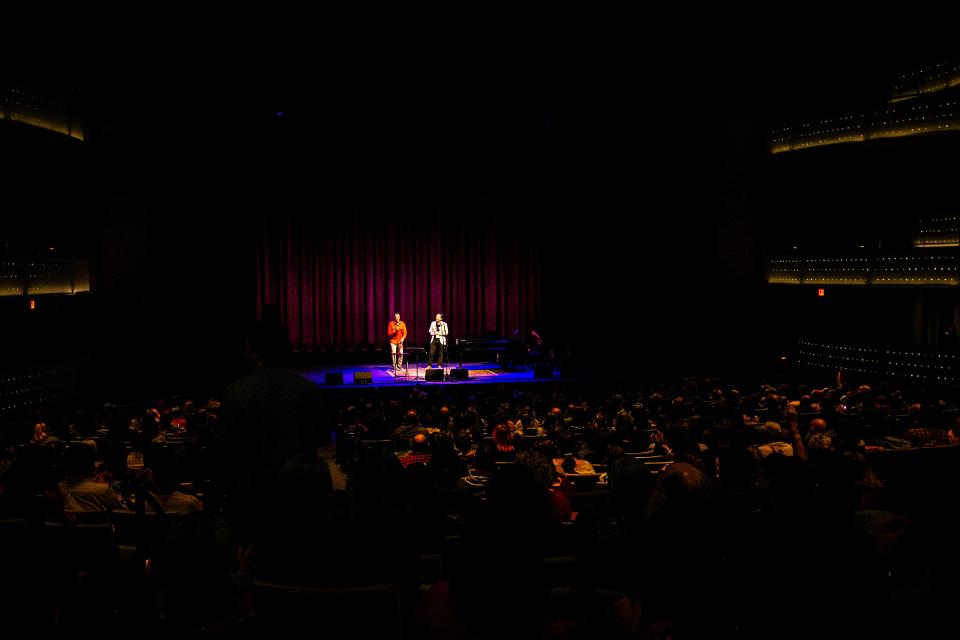 André Perry, executive director of the Hancher Auditorium, left, and John Schickedanz, executive director of the Englert Theatre, speak during Mission Creek Festival, Thursday, April 6, 2023, at Hancher Auditorium in Iowa City, Iowa.