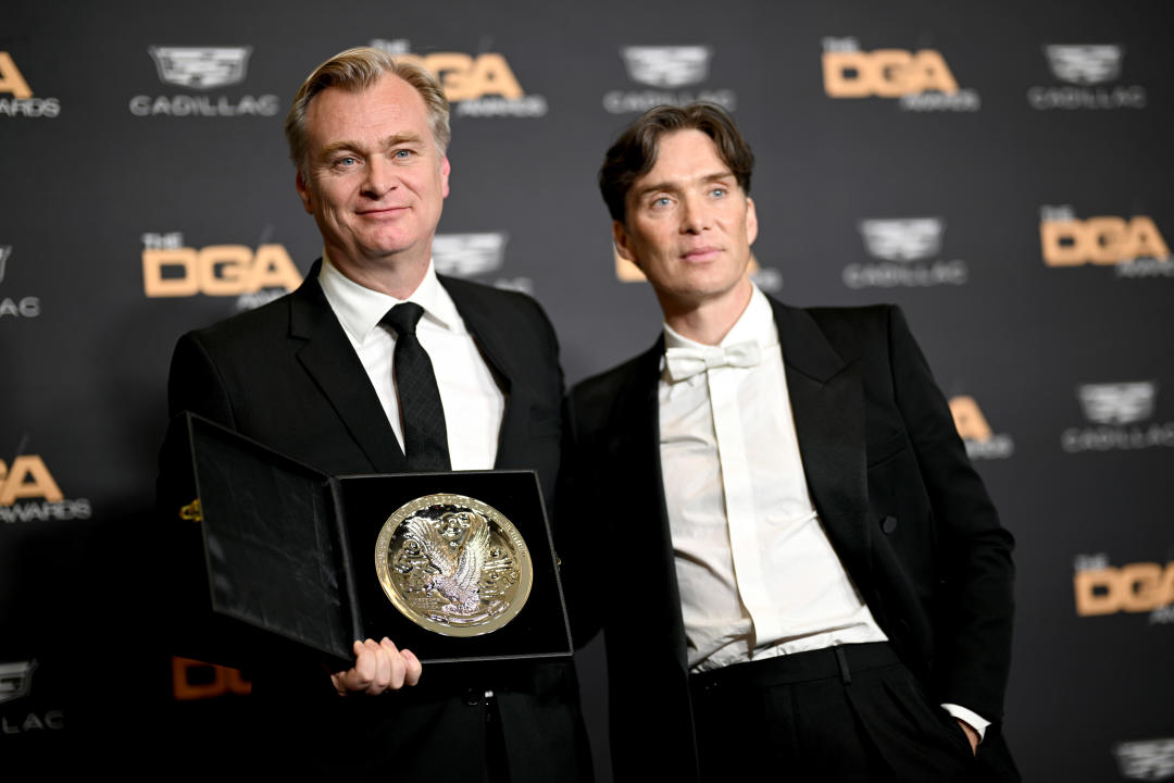 BEVERLY HILLS, CALIFORNIA - FEBRUARY 10: (L-R) Christopher Nolan, recipient of a Directors Guild of America Feature Film Medallion for 