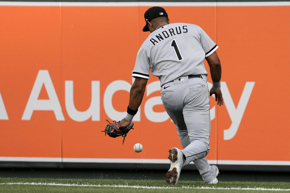 Chicago White Sox second baseman Elvis Andrus can't catch an RBI single hit by Kansas City Royals' Matt Duffy during the first inning of a baseball game Wednesday, May 10, 2023, in Kansas City, Mo. (AP Photo/Charlie Riedel)