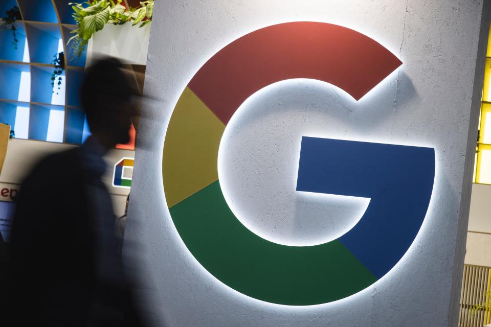 A logo sits illuminated outside the Google booth at ISE 2023 and IOT Solution World Congress at Fira Barcelona on January 31, 2023 in Barcelona, Spain.