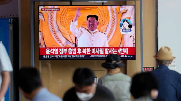 PHOTO: A TV screen showing a news program reporting about North Korea's missile launch with a file footage of North Korean leader Kim Jong Un, is seen at the Seoul Railway Station in Seoul, South Korea, on Aug. 17, 2022. (Lee Jin-man/AP Photo)