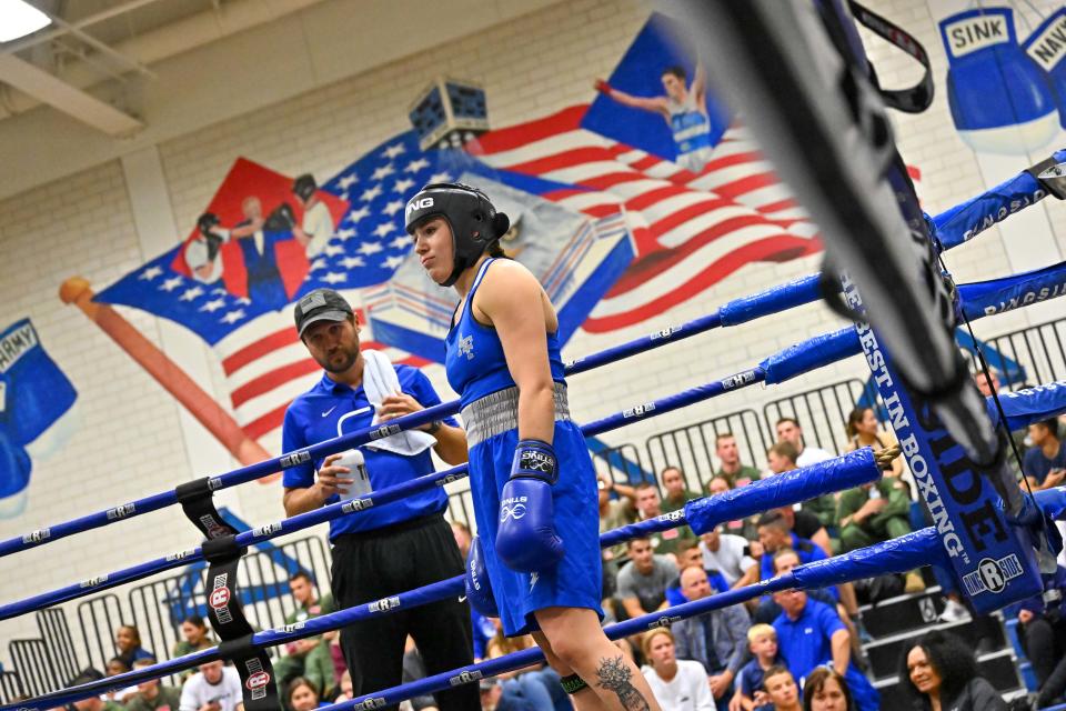 Peoria native Blake Baldi, head coach of the U.S. Air Force Academy boxing team, stands ringside during a match between Air Force and Navy in September of 2022.