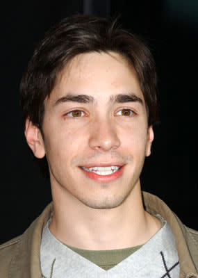 Justin Long at the Hollywood premiere of MGM's The Amityville Horror