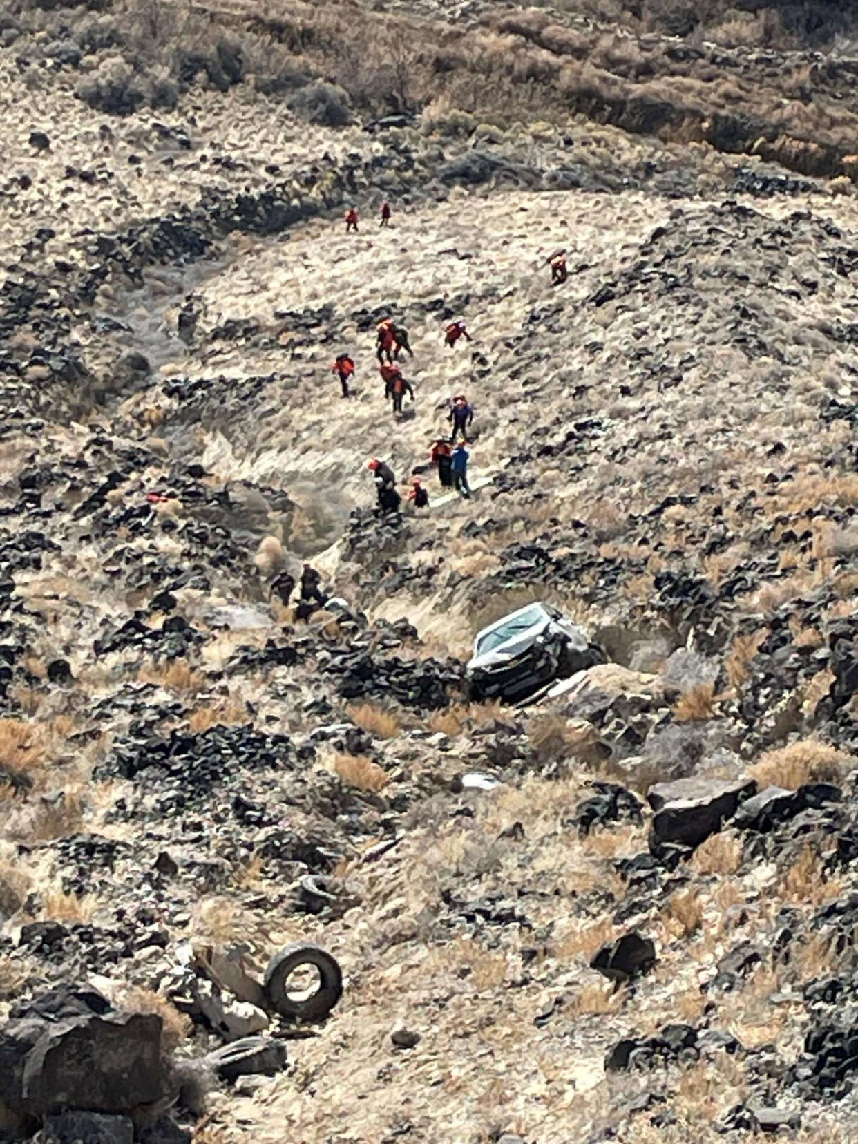Search teams rescued 72-year-old Penny Kay Clark and carried her on foot to a nearby ambulance for an evaluation Saturday. Medics believe she had been out in the wild for several days. (Canyon County Sheriff's Office)