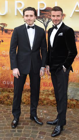 <p> David M. Benett/Dave Benett/WireImage</p> Brooklyn (left) and David Beckham