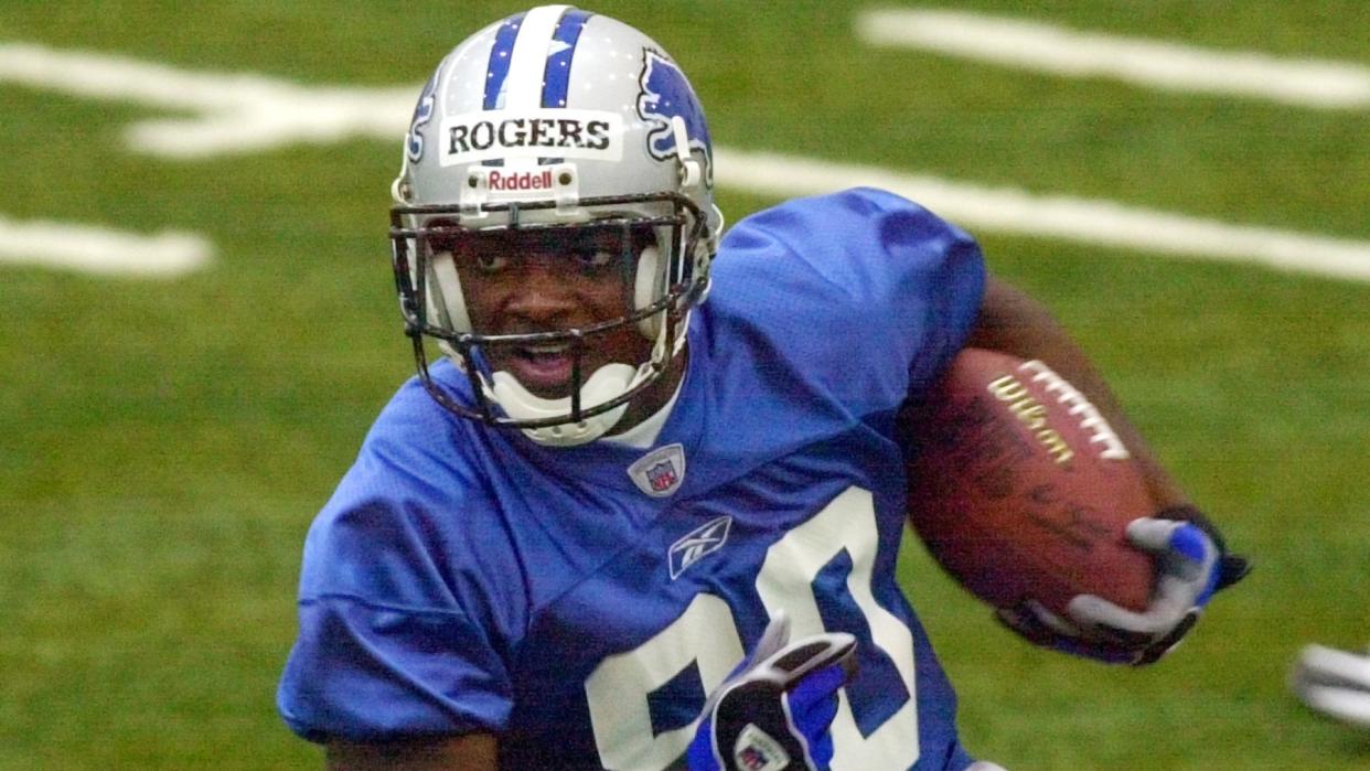 Mandatory Credit: Photo by Carlos Osorio/AP/Shutterstock (6425580a)ROGERS Detroit Lions first round draft pick Charles Rogers (80) of Michigan State runs a pass pattern during mini-camp at the Lions' training facility in Allen Park, MichLIONS MINI CAMP, ALLEN PARK, USA.