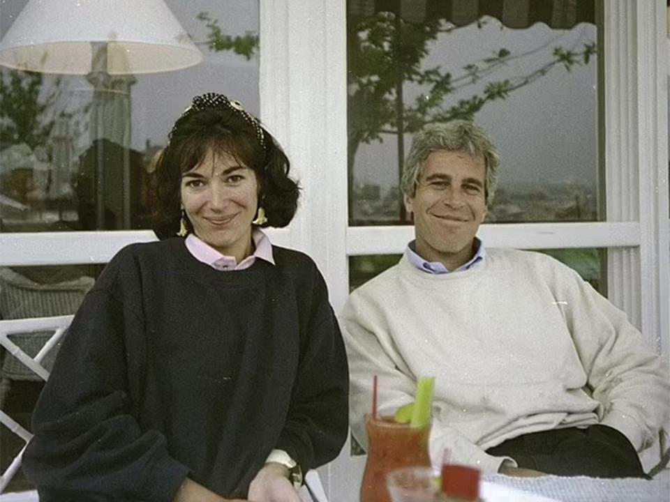 Maxwell with Jeffrey Epstein, the late billionaire for whom she trafficked young girls (US District Attorney’s Office)