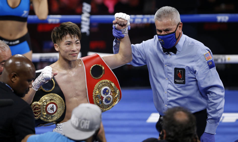 LAS VEGAS, NEVADA - JUNE 19: WBA/IBF bantamweight champion Naoya Inoue of Japan has his arm raised by referee Russell Mora after stopping Michael Dasmarinas of the Philippines in the third round of their title fight at Virgin Hotels Las Vegas on June 19, 2021 in Las Vegas, Nevada. (Photo by Steve Marcus/Getty Images)