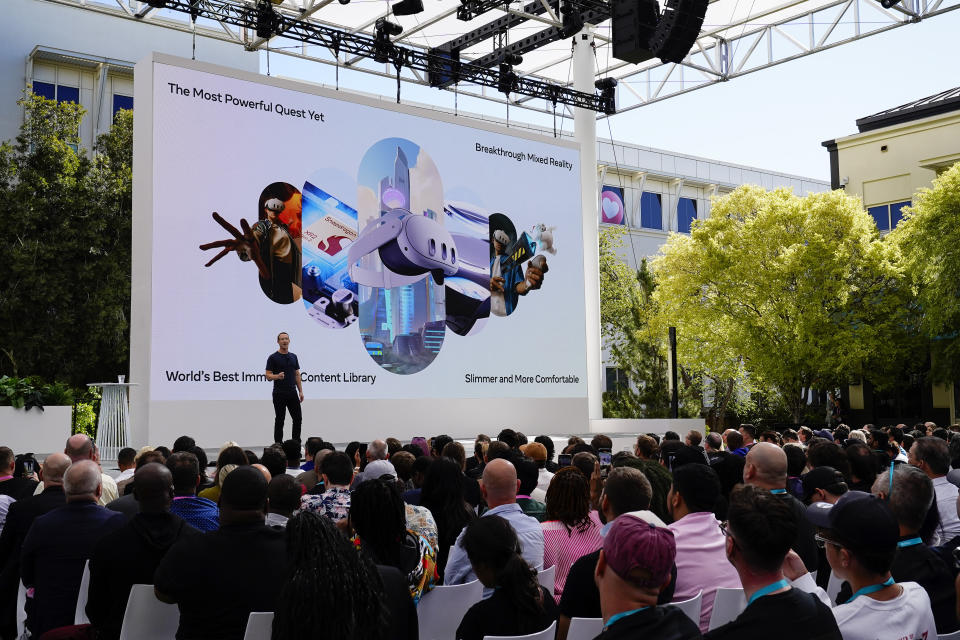 Meta CEO Mark Zuckerberg, left, speaks during the tech giant's Connect developer conference Wednesday, Sept. 27, 2023, in Menlo Park, Calif. The company, which renamed itself Meta two years ago, is expected to unveil the next version of its virtual reality headset, the Quest 3 and possibly discuss AI chatbots and other tools and features designed to keep users interested in Facebook and Instagram as competition with TikTok continues.(AP Photo/Godofredo A. Vásquez)