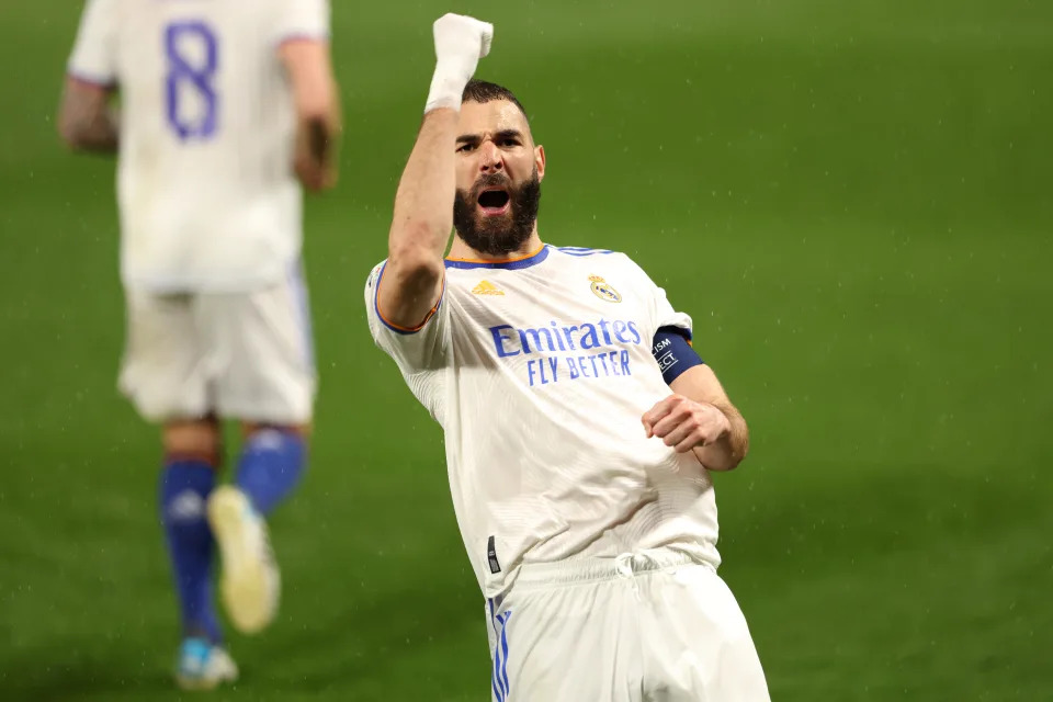 LONDON, ENGLAND - APRIL 06: Karim Benzema of Real Madrid celebrates after scoring their team&#39;s first goal during the UEFA Champions League Quarter Final Leg One match between Chelsea FC and Real Madrid at Stamford Bridge on April 06, 2022 in London, England. (Photo by Matthew Lewis - UEFA/UEFA via Getty Images)