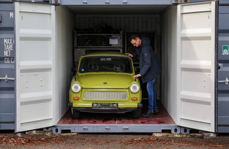 Frank Hofmann stands on the premises of his company Trabantwelt next to a faithfully rebuilt Trabant P 601. The online retailer offers all parts of the Trabant as spare parts. Jan Woitas/dpa