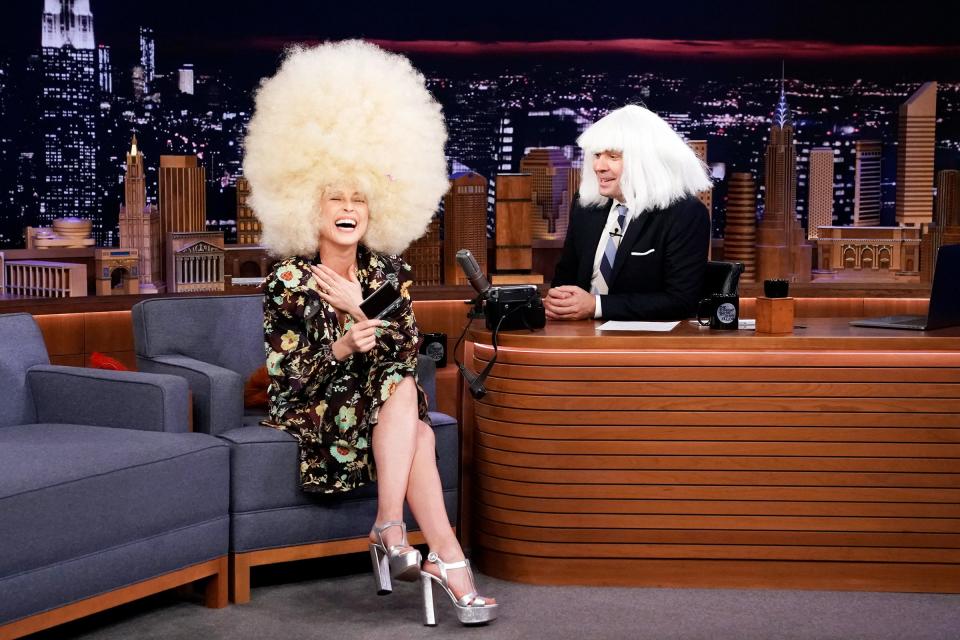 Guest star Noomi Rapace cracks up while wearing a blonde wig during Wednesday’s episode of <em>The Tonight Show Starring Jimmy Fallon</em> in New York City. 